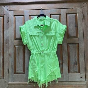 Lime green super cute romper with fringed bottom.